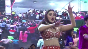 Shefali Jariwala performs on stage for a large crowd