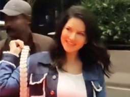 Sunny Leone flashes her cute smile while posing for paps