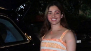 Tamannaah Bhatia looks beautiful in an orange flared outfit