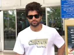 Vijay Deverakonda poses for a selfie with fans at the airport