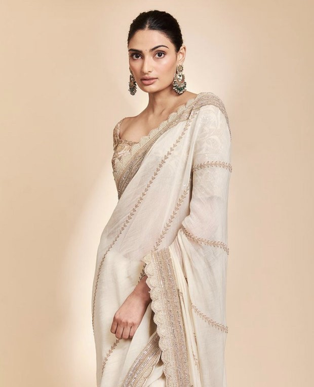Athiya Shetty goes all traditional in an ivory and golden saree by Anamika Khanna in latest photo-shoot