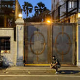 Comedian Hasan Minhaj poses in front of Shah Rukh Khan's bungalow Mannat in Mumbai: 'He didn’t answer tho'