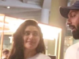 Karishma Tanna poses with her husband for paps