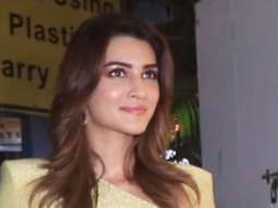 Kriti Sanon smiles for paps in beautiful yellow dress