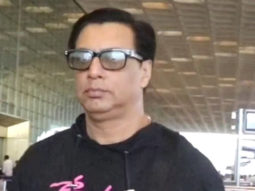 Madhur Bhandarkar rocks a black hoodie at the airport