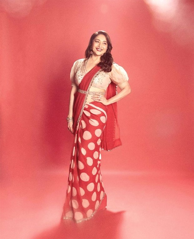 Madhuri Dixit regally captivates in Anju Modi’s red polka dot saree Madhuri Dixit regally captivates in Anju Modi’s red polka dot saree