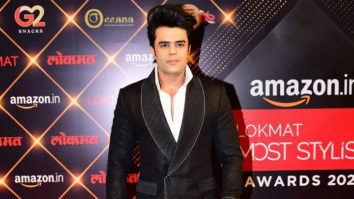 Maniesh Paul poses for paps in a stylish black suit