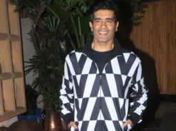 Manish Malhotra poses for paps along with Sophie Choudry