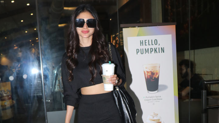 Mouni Roy greets paps in all-black outfit at the airport