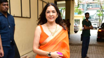 Neena Gupta looks flawless in orange saree as she smiles for paps