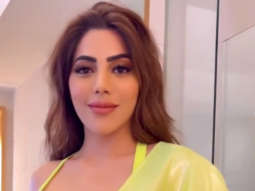 Nikki Tamboli raises the temperature with her neon saree