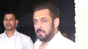 Salman Khan poses for paps in a white shirt