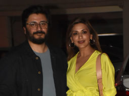 Sonali Bendre poses with husband in a bright yellow dress
