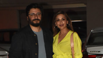 Sonali Bendre poses with husband in a bright yellow dress