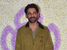 Sunil Grover smiles for paps in a green outfit