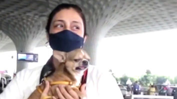 Tabu snapped at the airport with her cute little dog