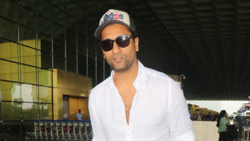 Vicky Kaushal poses for paps in a bright white shirt