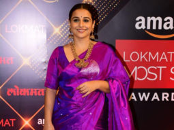Vidya Balan looks royal in purple saree and a flowery bun