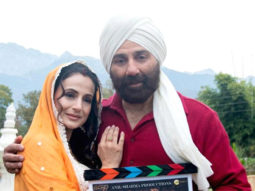 Ahead of Gadar 2, Ameesha Patel gets into the shoes of Sakeen as she signs a tee for a fan; watch