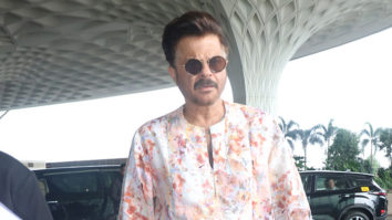 Anil Kapoor poses for paps at the airport