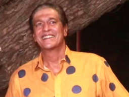 Chunky Panday smiles for paps in a yellow polka dotted shirt