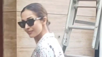 Malaika Arora shows off her flawless skin as she gets snapped