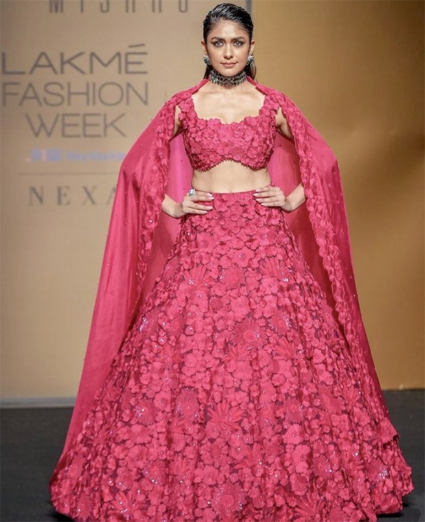 Mrunal Thakur dons three-piece crimson lehenga by Mishru as she walks the runway at The FDCI x Lakmé Fashion Week Mrunal Thakur dons three-piece crimson lehenga by Mishru as she walks the runway at The FDCI x Lakmé Fashion Week