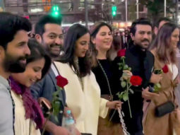 Ram Charan and Jr NTR walk with pride holding a rose on RRR’s background music