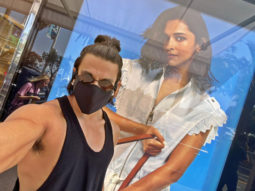 Ranveer Singh calls Deepika Padukone ‘my queen’; shares throwback photo from Cannes posing with her poster while shutting down separation rumours