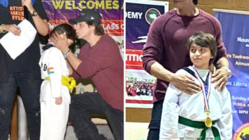 Shah Rukh Khan kisses Taimur Ali Khan while awarding him a medal at Taekwondo competition; poses with Kareena Kapoor Khan, Saif Ali Khan, Karisma Kapoor