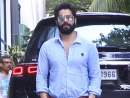 Varun Dhawan looks handsome in a blue shirt and bearded look