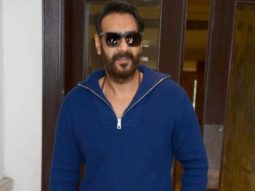 Ajay Devgn poses for paps in a blue hoodie