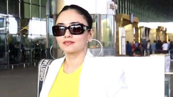 Amruta Khanvilkar greets paps at the airport