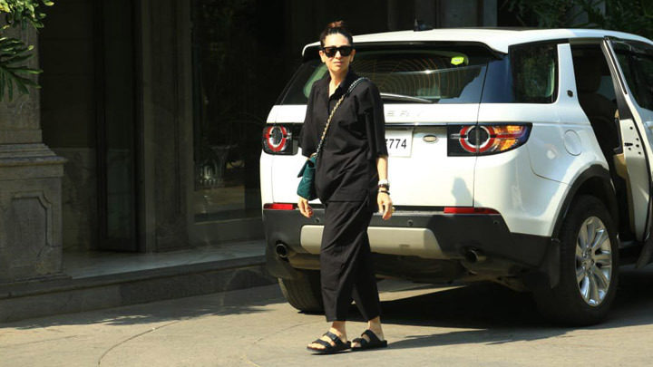 Karisma Kapoor waves at paps in an all black outfit