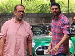 Kartik Aaryan poses for paps with Anand L Rai
