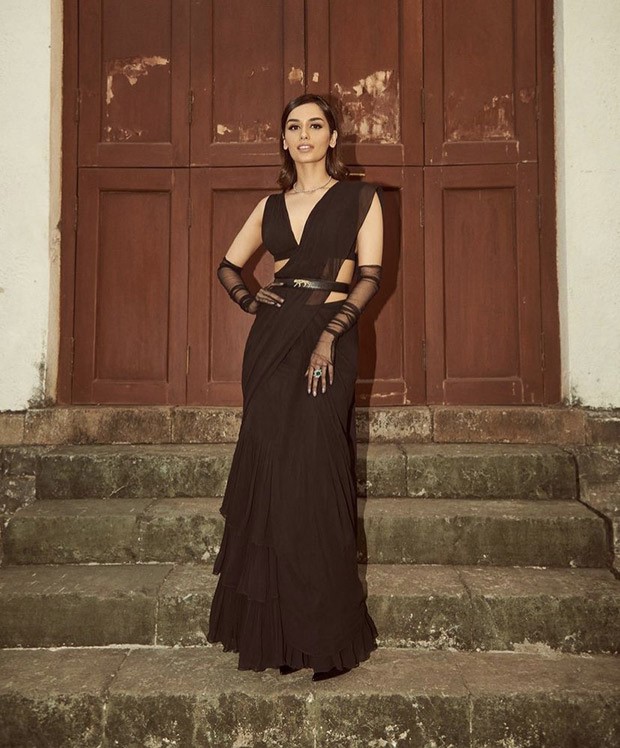 Manushi Chhillar attends India's first Forces of Fashion event and dazzles us with a regal black saree look.