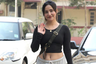 Neha Sharma flashes her cute smile for paps outside gym