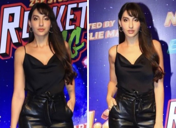 Jet-setting in style: Nora Fatehi rocks a chic blue outfit, black