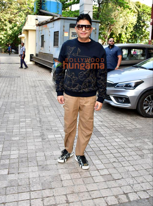 photos ajay devgn bhushan kumar and kumar mangat pathak attend the teaser preview of the film bholaa 2