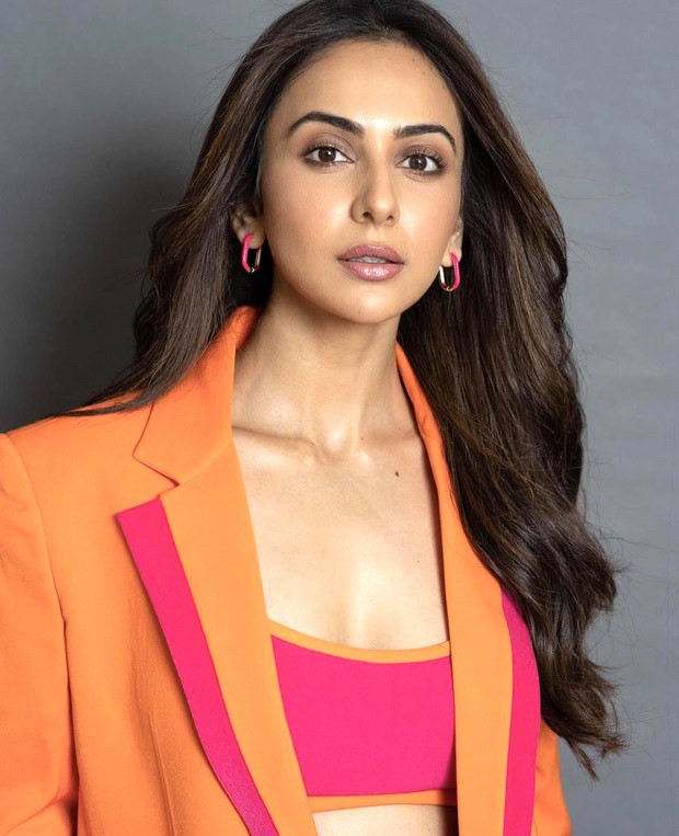 Rakul Preet Singh give notes on how to master colour blocking this season in an Orange and pink pantsuit worth Rs. 18,000!