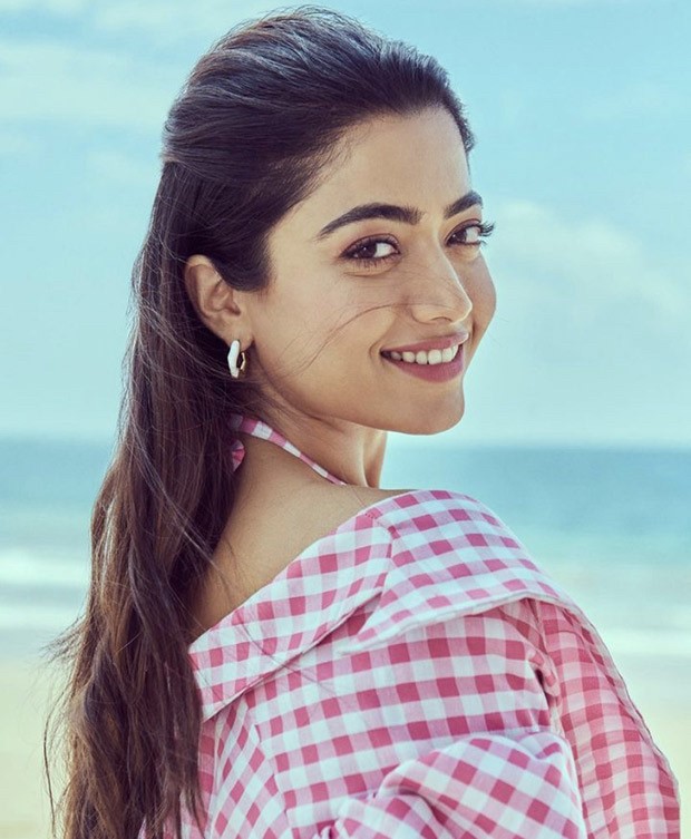 Rashmika Mandanna is a breath of fresh air as she poses at the beach wearing a sweet pink chequered cut-out dress
