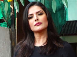 Zareen Khan poses for paps in black tshirt and denims