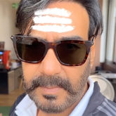 Ajay Devgn shares a BTS video of him shooting for Bholaa; says, “It’s good when a mob chases you”