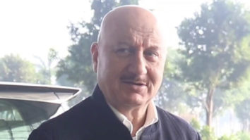 Anupam Kher greets his fans & paps on the airport