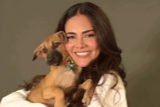 Esha Gupta looks adorable as she plays with a pup