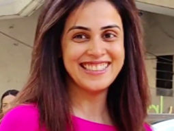 Genelia D’souza gets clicked in a bright pink tshirt as she smiles for paps
