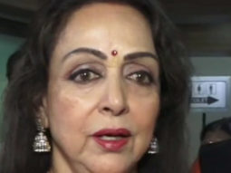 Hema Malini looks extremely elegant in a pink saree