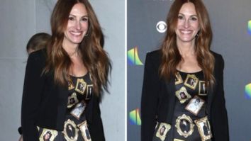 Julia Roberts honours George Clooney in a gown covered with pictures of the actor