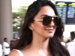 Kiara Advani smiles for a selfie with a fan at the airport