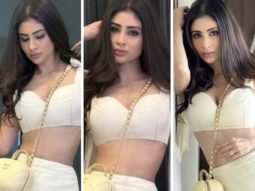 Mouni Roy offers up the hottest Christmas brunch ensemble in a cropped white bustier and a frilly white miniskirt